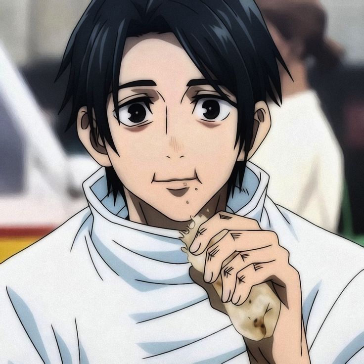 an anime character with black hair and blue eyes is holding a piece of bread in his hand