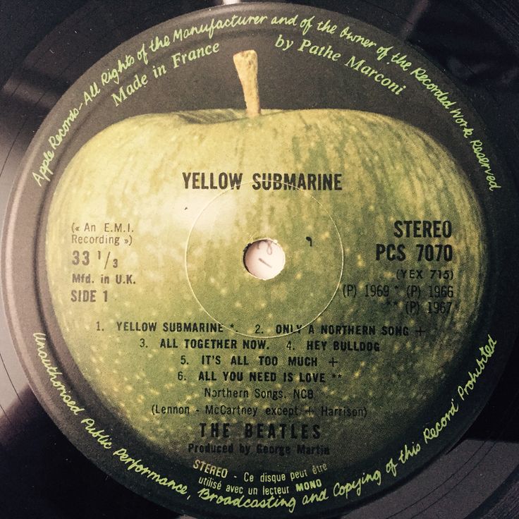 the label for yellow submarine records on a record player's side - by - side