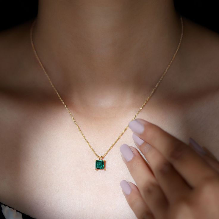 Product Details Emerald is known for its Elegance. The Solitaire Pendant is embellished with 6 MM Princess Cut Lab Created Emerald with a 14K Solid Gold Bail in 4 Prong Setting is a must have Party Wear Jewelry. Product Information SKU SHP-PENDANT082019417 Length 9 mm Width 6.8 mm Weight 3.12 gm (Approximate) LAB CREATED EMERALD INFORMATION No.of Stones 1 Pieces Total Weight 1.20 Carat (Approximate) Dimension(approx) Princess Cut-6X6 mm-1 Pcs Color Green Cut Brilliant Shape Princess Cut Setting Formal Emerald Necklaces With Diamond Cut, Exquisite May Birthstone Necklaces For Formal Occasions, Exquisite May Birthstone Necklace For Formal Occasions, Formal Diamond Cut Necklace For May Birthstone, Luxury Gold Solitaire Necklace For Wedding, Elegant Yellow Gold Emerald Necklace With Diamond Accents, Luxury May Birthstone Necklace With Diamond Accents, Elegant Emerald Necklace With Prong Setting For Formal Occasions, Elegant Formal Emerald Necklace With Prong Setting