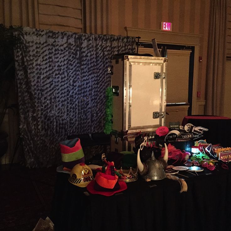 a table with hats and other items on it