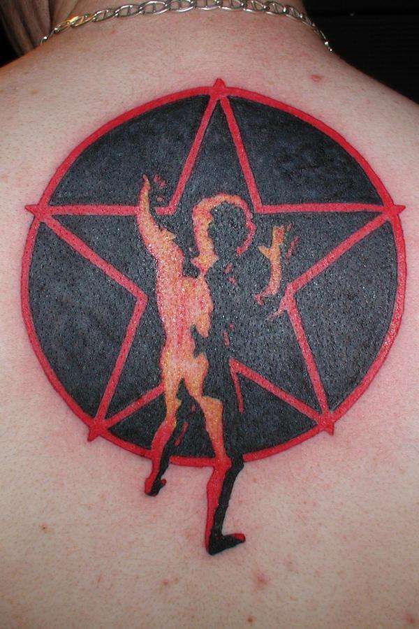 a person with a star tattoo on their back