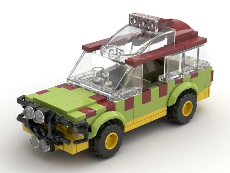 a green and yellow lego car with a roof rack on it's flatbed