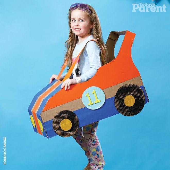 Craft: Make your own cardboard race car - Today's Parent Race Car Costume, Car Costume, Cardboard Box Car, Carton Diy, Cardboard Car, Hot Wheels Party, Race Car Party, Race Car Birthday, Cars Birthday Parties