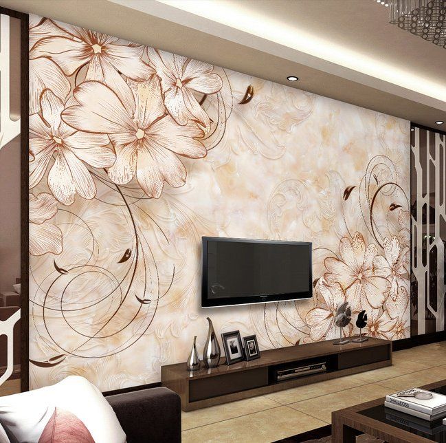 this living room is decorated with floral wallpaper and modern furniture, along with a flat screen tv