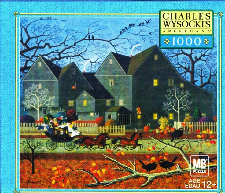 a puzzle box with a horse drawn carriage in front of a large house and trees