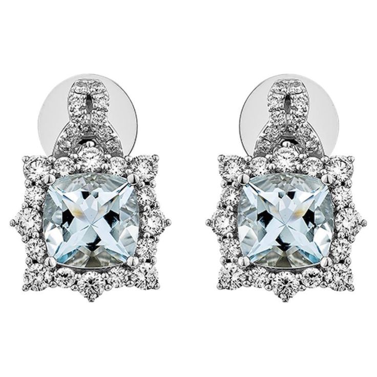 This collection features an array of Aquamarines with an icy blue hue that is as cool as it gets! Accented with Diamonds these Stud Earrings are made in White Gold and present a classic yet elegant look. Aquamarine Stud Earrings in 18Karat White Gold with White Diamond. Aquamarine: 2.39 carat, 7X7mm size, Cushion shape White Diamond: 0.255 carat, 1.60mm size, round shape, G color, VS clarity. White Diamond: 0.565 carat, 2.00mm size, round shape, G color, VS clarity. White Diamond: 0.098 carat, 1.00mm size, round shape, G color, VS clarity. Gold: 5.128g, 18Karat white Gold. Butterfly Pin and Push Back. E543 Formal White Gold Earrings With Blue Topaz, Elegant Blue Platinum Earrings, Luxury Platinum Blue Earrings, Luxury Silver Bridal Earrings In Platinum, Luxury Silver Bridal Earrings With Halo Setting, Luxury Blue Platinum Earrings, Fine Jewelry Light Blue Earrings For Formal Occasions, Light Blue Fine Jewelry Earrings For Formal Occasions, Formal Light Blue Fine Jewelry Earrings