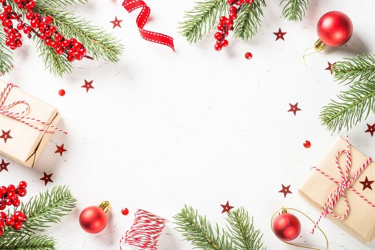 christmas decorations and presents on white background with copy - space in center for text or image