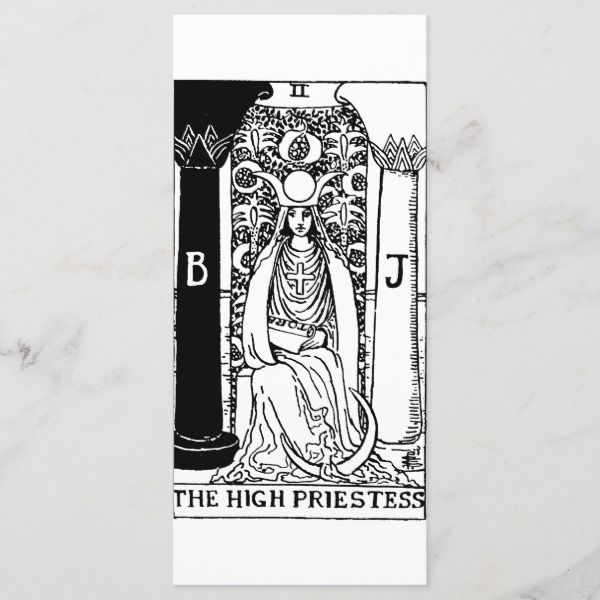 the high priestess tarot card on a marble surface with black and white ink