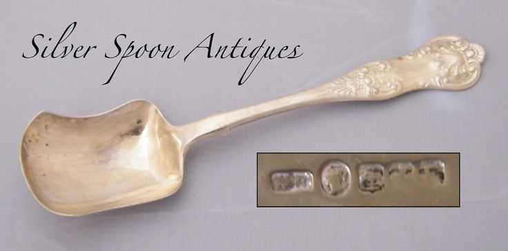 an antique silver spoon with the words silver spoon antiques on it