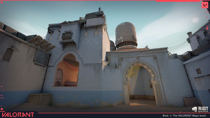 an old white building with two towers on top