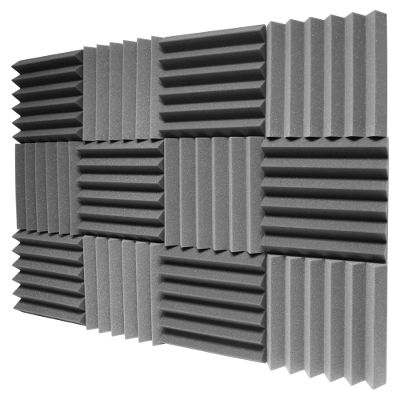 a wall made up of several different types of sound absorbing foams, all in various colors and sizes