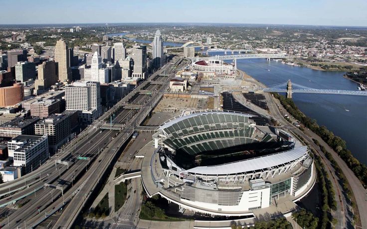 an aerial view of a large stadium in the city