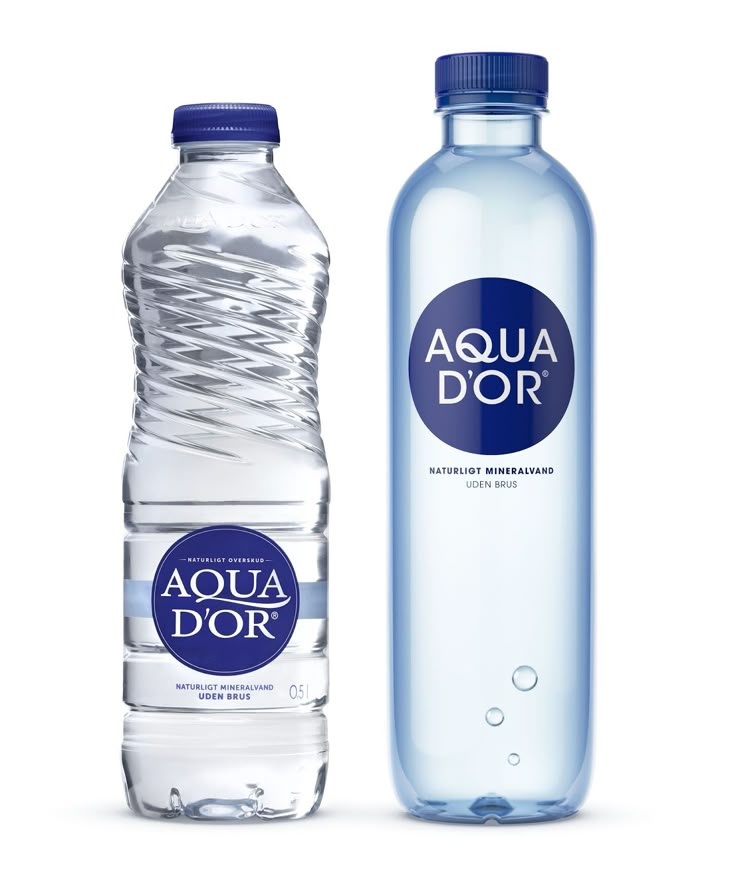 two bottled water bottles next to each other on a white background with the words aqua dor