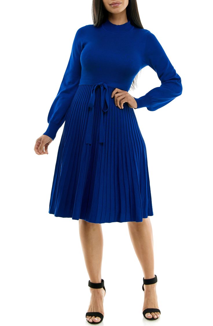 A tonal sash accentuates your figure in a long-sleeve sweater dress with a flattering fit-and-flare profile. 41 1/2" length Mock neck
 Long sleeves 78% rayon, 22% polyester Machine wash, tumble dry Imported Model stats: 5'10" height, 32" bust, 25" waist, 36" hip. Non-stretch Long Sleeve Sweater Dress, Belted Long Sleeve Midi Dress For Fall, Fall Midi Length Belted Long Sleeve Dress, Winter Pleated Long Sleeve Dress, Long Sleeve Pleated Midi Dress For Winter, Pleated Long Sleeve Midi Dress For Winter, Solid Pleated Midi Dress For Winter, Winter Pleated Long Sleeve Midi Dress, Ribbed Long Sleeve Dress For Fall