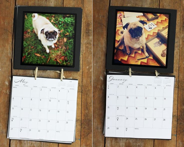 two calendars with pictures hanging on them