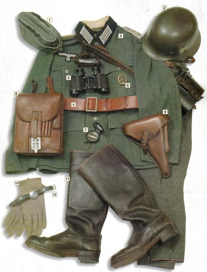 an army uniform is shown with gloves, hats and other items on it's side