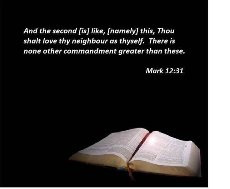 an open book with the bible versed in black and white on it, against a dark background