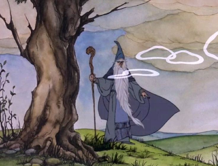 the wizard is standing in front of a tree and holding a staff with an oog written on it