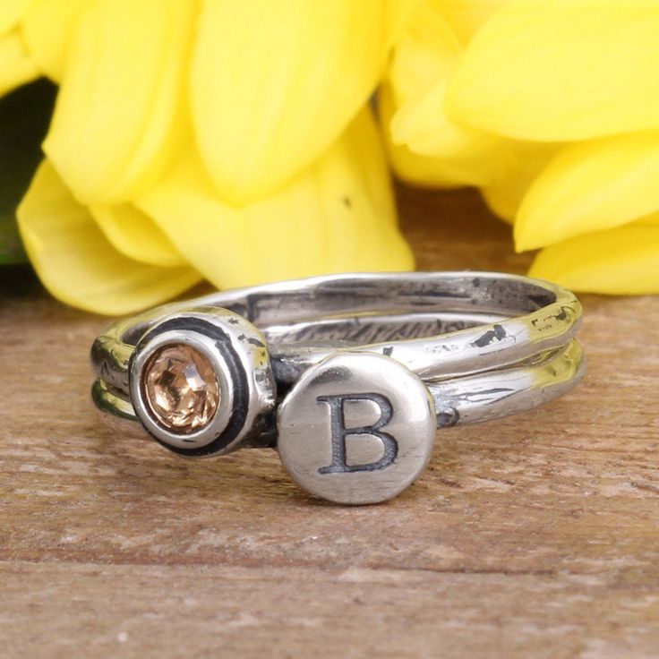 "This set of two stackable rings can represent the initial and birthstone of your child or any loved one. This also makes a great gift for graduation or a birthday. Or, wear your own birthstone and initial! Add to this ring over time by stacking more bands. Give the gift of this perfect mother's or grandmother's stacking ring set! Need more than 2 rings in your set? Create your own stack here: https://www.etsy.com/listing/230740149 These rings are also available in GOLD: https://www.etsy.com/lis Adjustable Stackable Rings With Initials, Customizable Silver Birthstone Ring, Customizable Adjustable Silver Birthstone Ring, Adjustable Stackable Initial Ring, Adjustable Stackable Rings With Initials For Gift, Adjustable Stackable Initials Rings As Gift, Adjustable Stackable Initial Ring As Gift, Personalized Adjustable Stackable Rings For Anniversary, Adjustable Personalized Stackable Rings