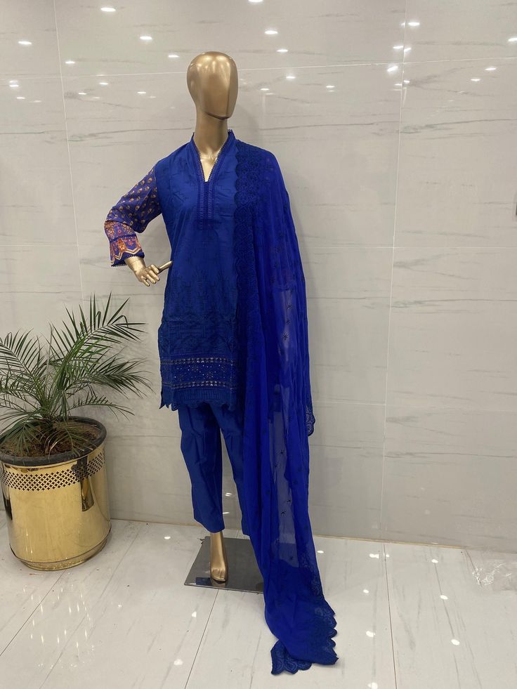 Fabric:   lawn   3 pc shirt trouser dupatta  Shirt: Embroidered chicken kari  shirt  beautifully embroidered chicken kari daman printed embellished sleeves , printed  back  embroidered  chiffon duptta  Plain trouser Measurement  🧵  medium 👗  Shoulder: 15  Chest: 40 Waist: 46 Sleeves length: 18 Shirt length: 38  Aramhole: 9.5  Trouser length: 37  Large 👗  Shoulder: 15  Chest: 46  Waist: 49 Sleeves length: 19 Shirt length: 40  Aramhole: 10.5  Trouser length:  37 Blue Mulmul Designer Churidar, Blue Cambric Sets With Chikankari Embroidery, Blue Cotton Lawn Suit With Resham Embroidery, Blue Mulmul Churidar With Resham Embroidery, Designer Wear Chanderi Lawn Suit With Self Design, Designer Chanderi Lawn Suit With Self Design, Cotton Long Sleeve Lawn Suit With Self Design, Long Sleeve Cotton Lawn Suit With Self Design, Fitted Lawn Suit With Self Design In Shantoon