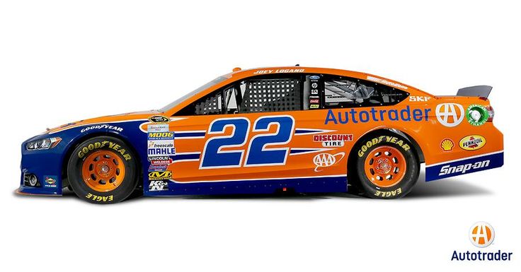 an orange and blue car with numbers on it