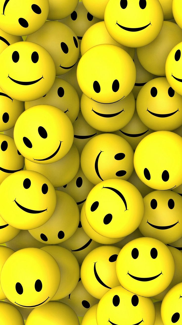 many yellow smiley faces with black eyes and one has a smile on it's face