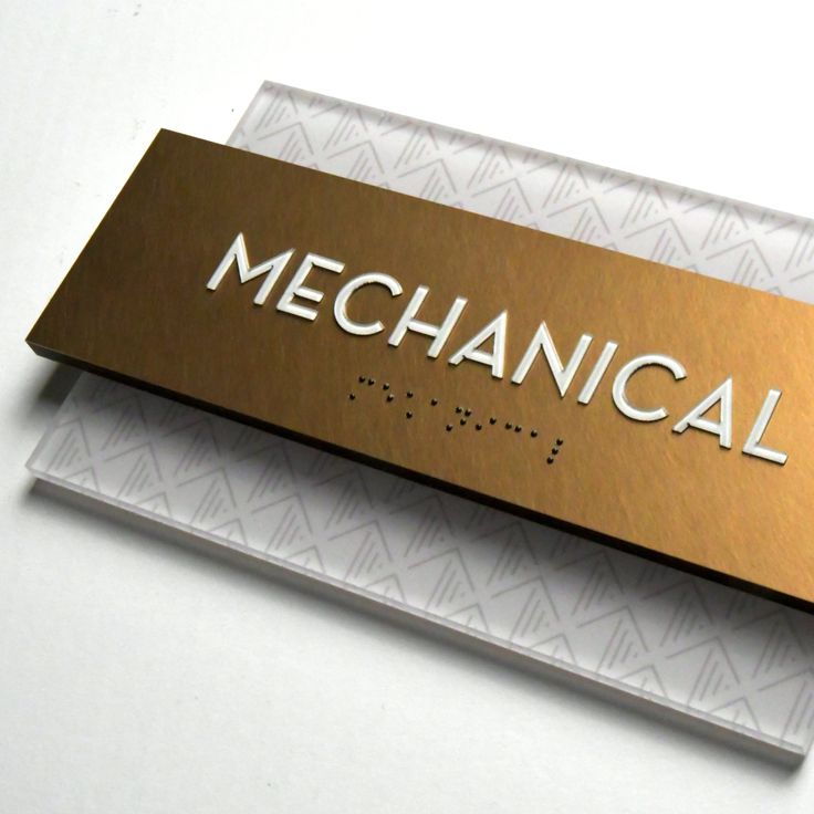 a metal sign that says mechanical on it