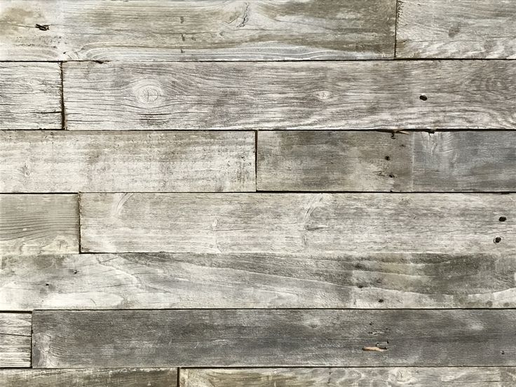 an old wooden wall is shown in this image, it looks like wood planks