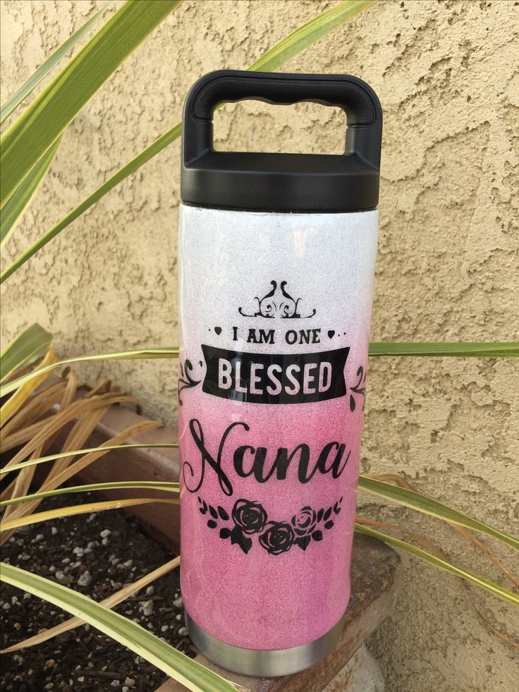 a pink and white tumbler with the words i am one, blessing nama on it