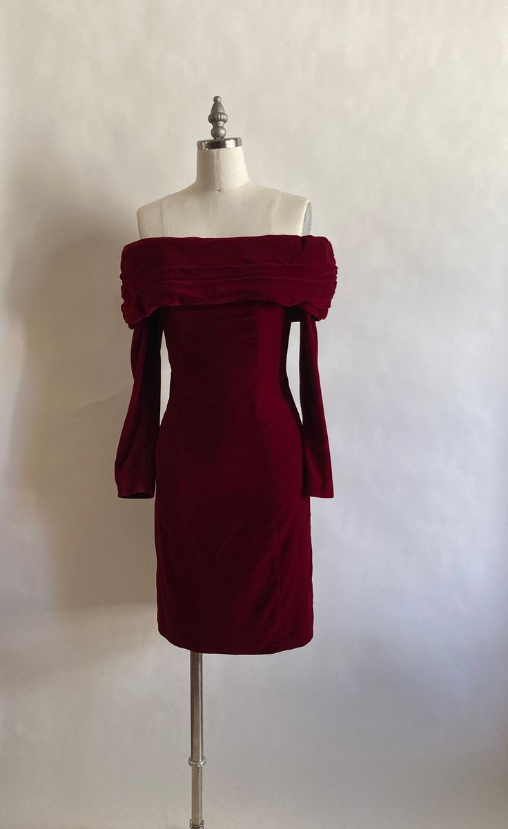 "1980s rich cherry red velvet off the shoulder long sleeve wiggle dress by ZumZum.  Dress zips up in the back and finishes with a hook and eye closure. Bodice is lined in acetate; skirt and sleeves are not lined. In excellent condition. 69% acetate 16% rayon 15% nylon Shoulder to shoulder 19\" across Chest 34\" Waist 26.5\" Hips 34\" Length from top of shoulder to hem 34\" Arm length from armpit to cuff 17\"" Red Velvet Dress Outfit, Red Party Dress Short, Prom Dresses Dark Red, Masquerade Ball Outfit, Red Lace Long Sleeve Dress, Cherry Red Dress, Red Vintage Dress, Velvet Dresses Outfit, Birthday Things