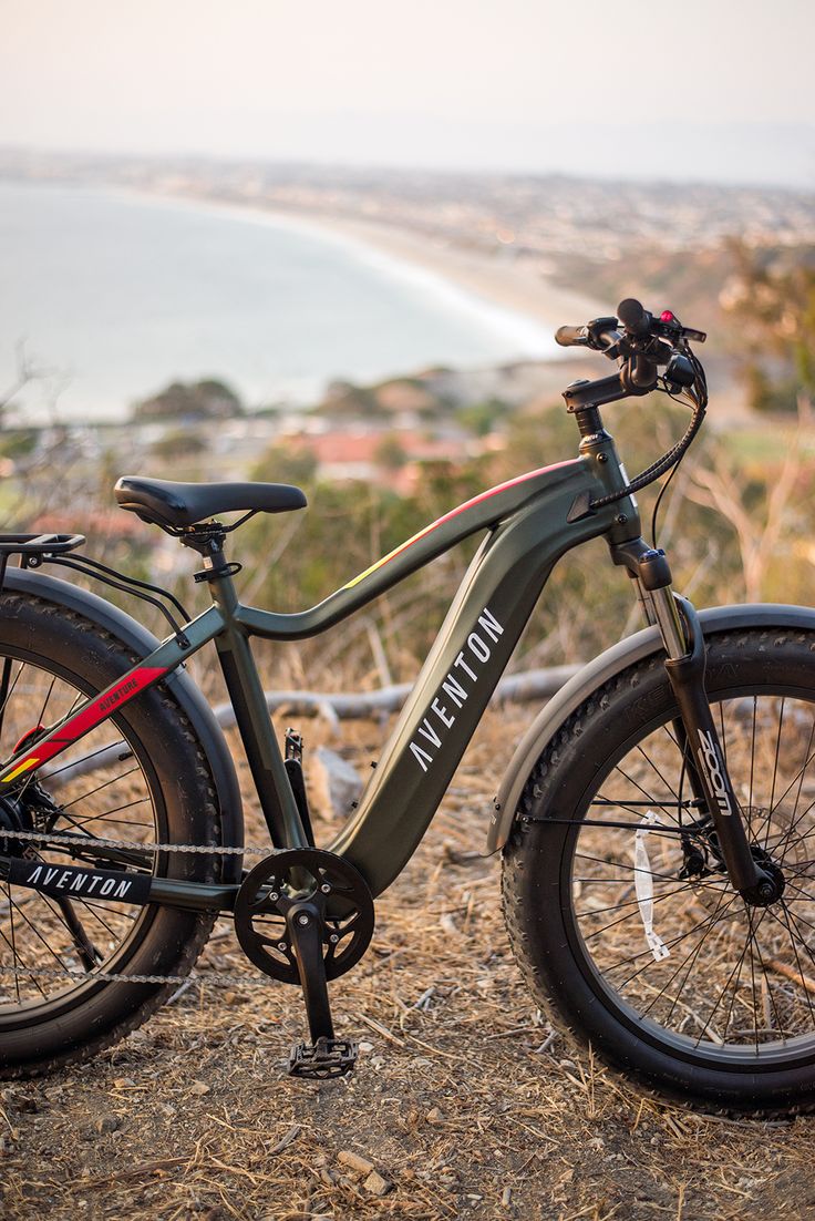 an electric bike parked on top of a hill