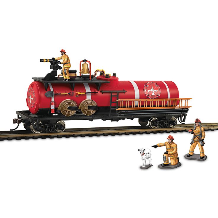 a toy train with two men on the tracks and one man standing next to it