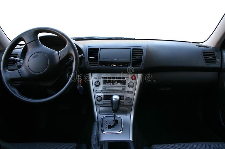 the interior of a car with dashboard and steering wheel