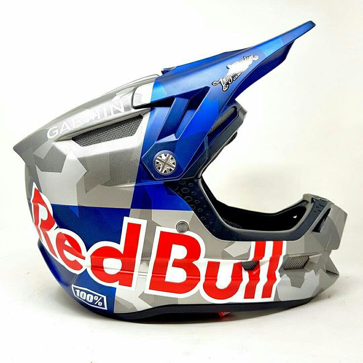 a red bull helmet is shown on a white background with the word's logo painted on it