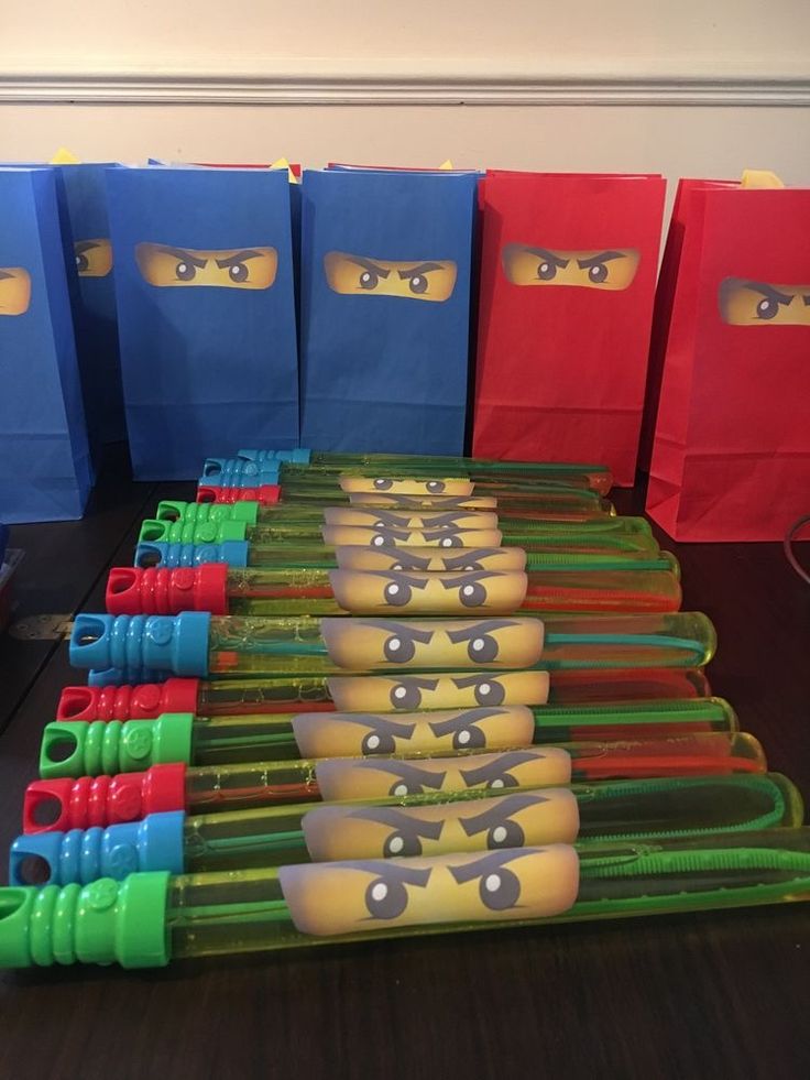 the lego movie character bags are lined up with each other's eyes and noses