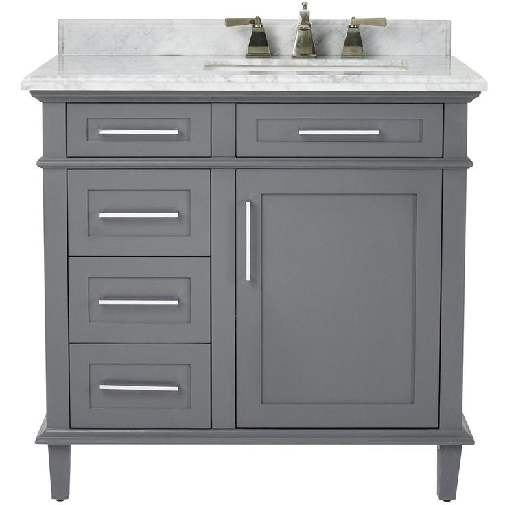 a gray bathroom vanity with two sinks and white marble counter top on an isolated white background