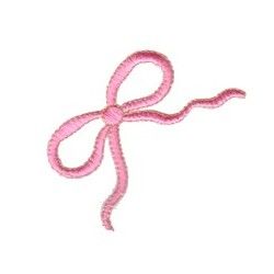 a pink ribbon is tied to a white wall