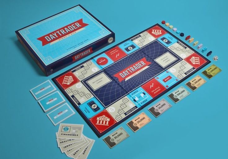 a board game set up on a blue surface