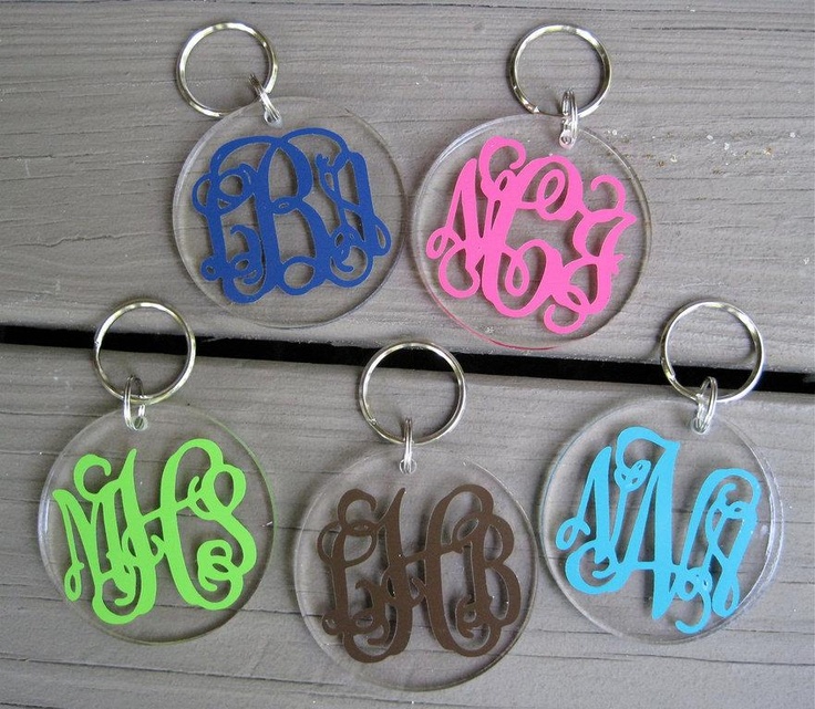 four different color acrylic monogrammed key chains