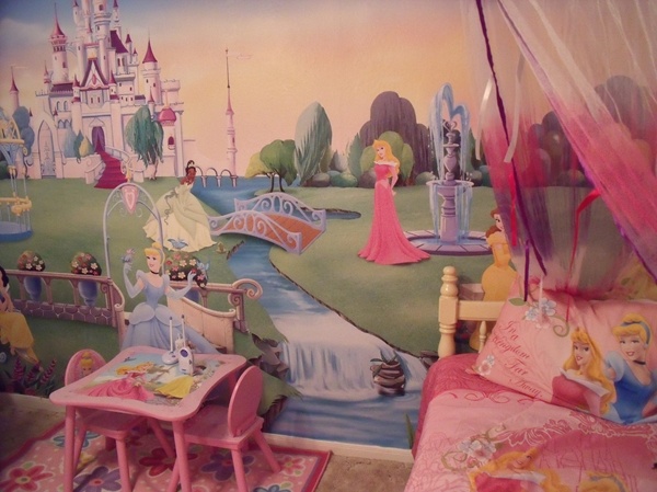 a bedroom with princess themed walls and furniture