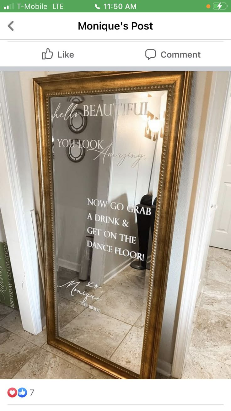 a large mirror sitting on top of a tiled floor