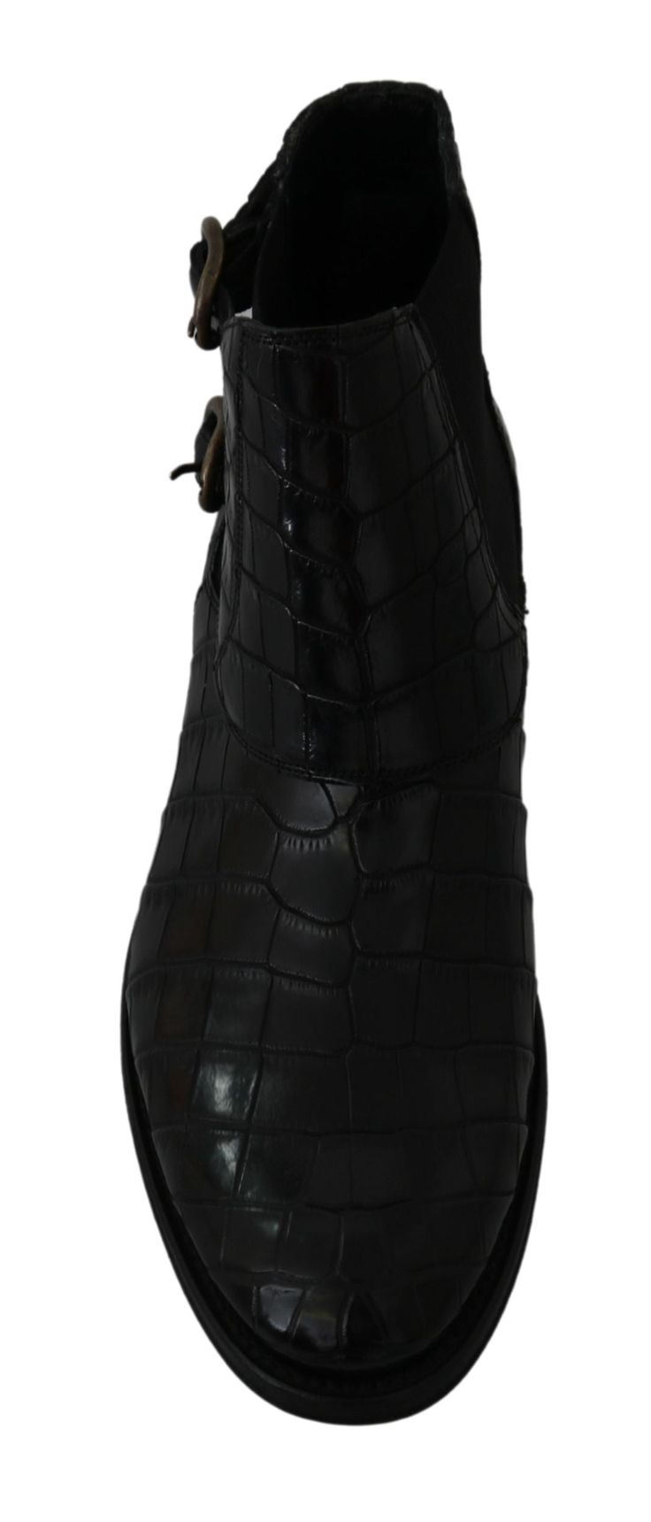 Discover timeless sophistication with these Dolce & Gabbana Derby brogue boots, a testament to exceptional Italian craftsmanship. Perfect with tags and authenticity guaranteed, these boots feature a luxurious blend of materials and Goodyear leather soles, ensuring both style and durability. Color: Black Material: 74% Crocodile, 13% Cotton, 13% Viscose Country of origin: IT Logo details Made in Italy