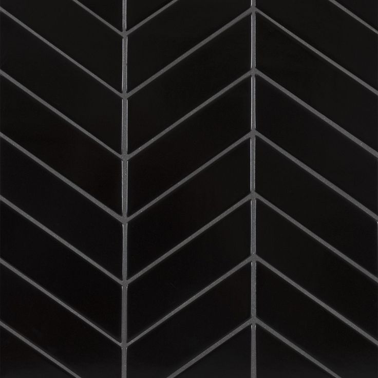 black and white chevroned tiles with lines on them