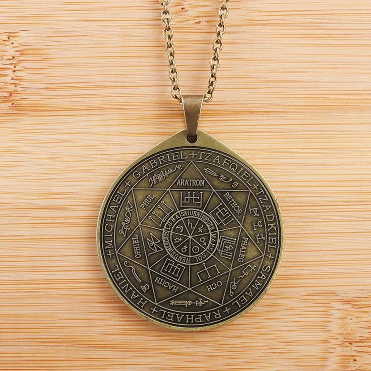 Embark on a journey into the mystical realms of ancient Israel with our Seven Archangel Necklace. Intricately designed, this necklace features the revered symbols of the Seven Archangels, embodying divine protection, guidance, and spiritual illumination. Crafted with care, each symbol is intricately detailed to capture the essence of their sacred presence. Made from high-quality materials, this necklace exudes both elegance and spiritual significance. Metals Type: Zinc alloy Shape\pattern: Round Mens Vintage Jewelry, Seven Archangels, Talisman Jewelry, Talisman Necklace, Compass Pendant, Star Magic, Amulet Necklace, Retro Punk, Round Pendant Necklace