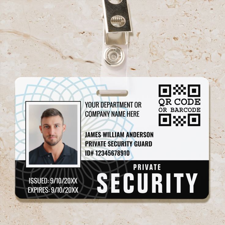 an id card with a security badge attached to the front and back side of it