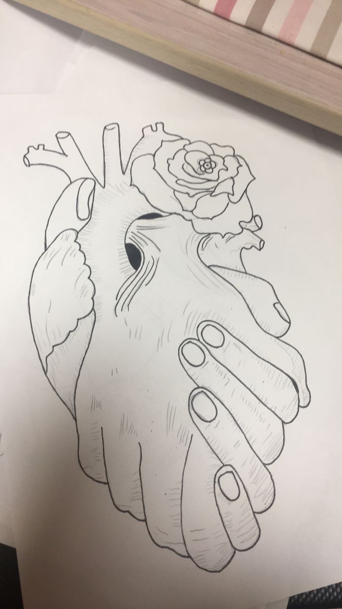 a drawing of a heart with a rose on it