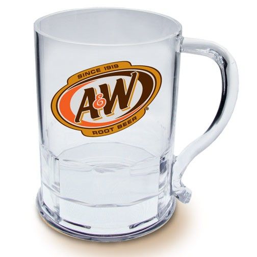 a clear glass mug with an orange and white logo