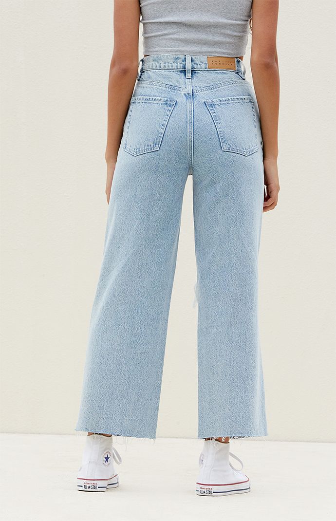 The Light Indigo Ripped Cropped Wide Leg Jeans from PacSun bring a rebellious update to your denim collection. These high-waisted jeans feature a trendy cropped wide-leg silhouette, ripped knee details, and a raw-cut hem.  Learn more about PacSun eco items Cute Jeans Wide Leg, Affordable Jeans For Women, Cute Pants Aesthetic, Pacsun Clothes, Cute Basic Outfits, Cute Jean Outfits, Preppy Jeans, Pacsun Outfits, Wide Leg Ripped Jeans