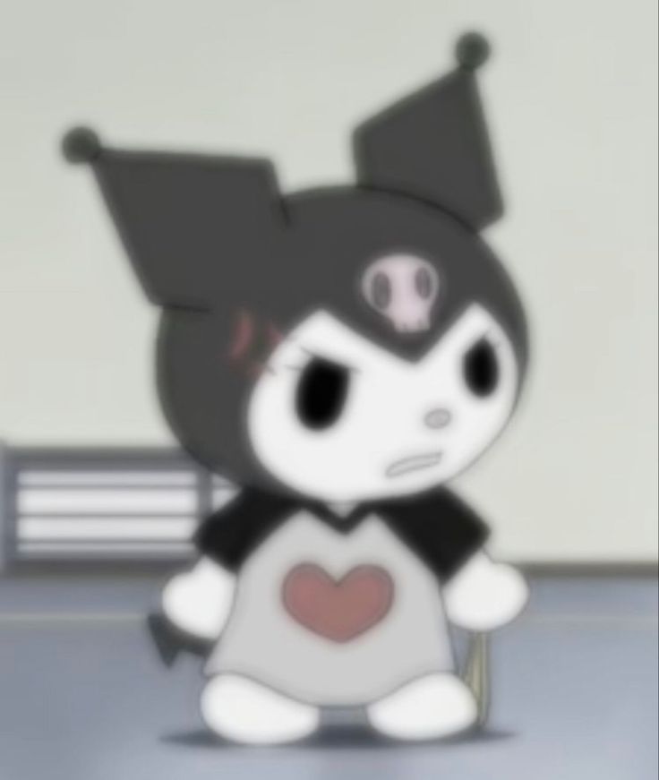 a cartoon character sitting on the ground in front of a white wall with a black and red heart