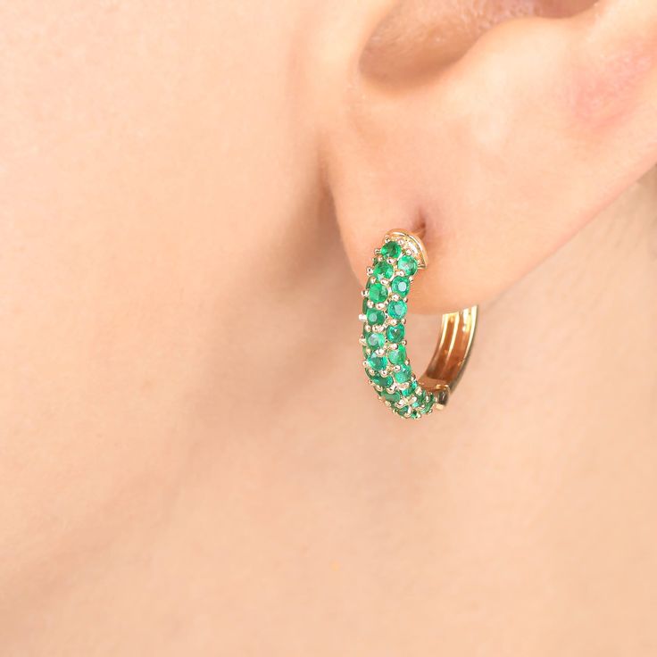 Emerald huggies earrings hoops 14K gold | Natural emerald cut earrings | Emerald earrings gold | Emerald studs tops huggies | Emerald hoops  STONE DETAILS : ✦ Gemstone : Emerald ✦ Gemstone Type : Natural ✦ Gemstone Size : 1.80 MM ✦ Gemstone Shape : Round Cut ✦ Number of gemstones : 56 ✦ Gemstone Weight : 2-3 carats ✦ Gemstone Grade : AAA METAL DETAILS : ✦ Metal : 14K/18K Gold ✦ Metal Color : Yellow / White / Rose Gold ✦ Setting : Prong Setting / Pave Setting ✦ Earring Box : Yes SHIPPING DETAILS May Birthstone Gemstone Huggie Jewelry, Emerald Huggie Earrings For Anniversary, Emerald Huggie Earrings For May Birthstone, Huggie Hoop Earrings With May Birthstone Gemstone, Yellow Gold Emerald Huggie Jewelry, Fine Jewelry Emerald Huggie Earrings, Green Huggie Fine Jewelry Earrings, Green Huggie Earrings Fine Jewelry, Fine Jewelry Emerald Hoop Earrings